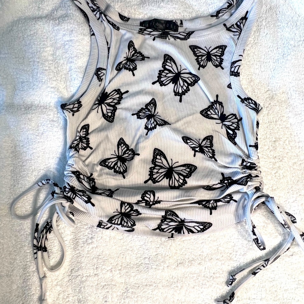 It was gifted & worn a few times only. Fits like a small.